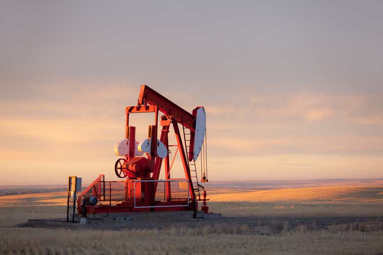 Red Prairie Pumpjack in Alberta Oil Field