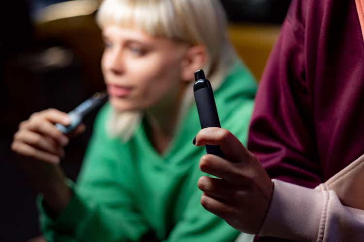 Close up of smoking a vape.