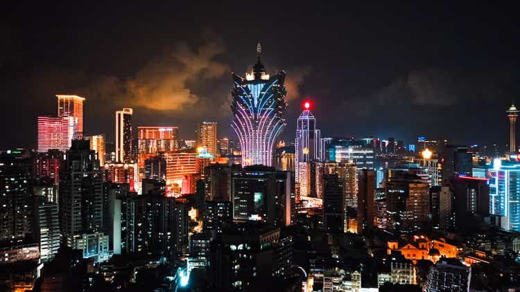 Cityscape view of Grand Lisboa Casino skyscraper in Macau Island, financial business or entertainment district. Night view taken by drone.Asia travel landmark concept
