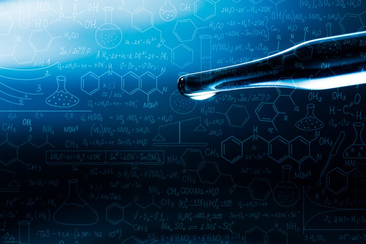 Macro science background,macro science experiment background,Laboratory research, dropping liquid to test tube. Test tube containing chemical liquid in laboratory, lab chemistry or science research and development concept.