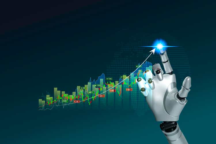 Robot trading concept. Robot hand represents use of artificial intelligence in trading stocks. Coin are laid out in graph. Inflation is falling all over the world. wealth stock investing concept .