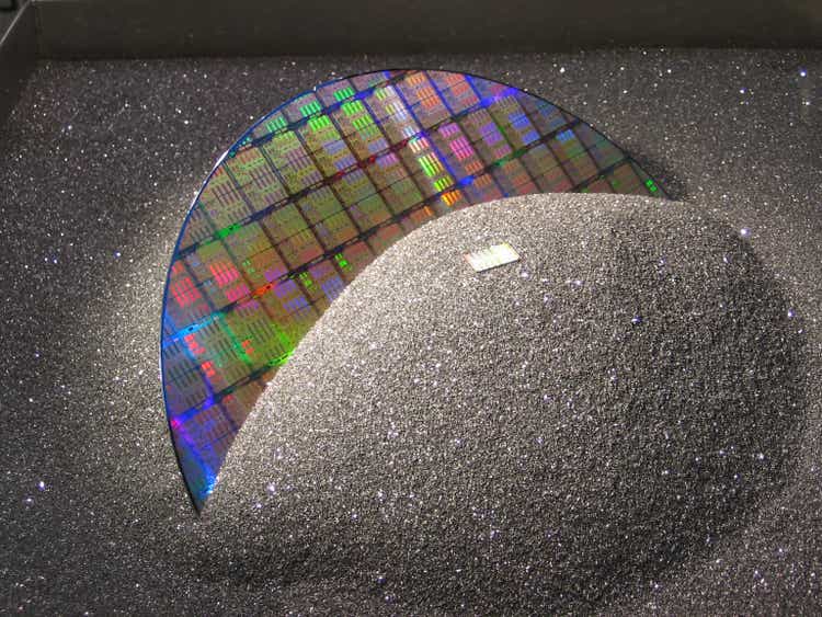 A silicon wafer covered with black sand