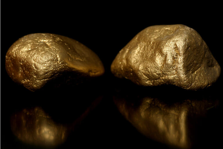 Gold nuggets on black