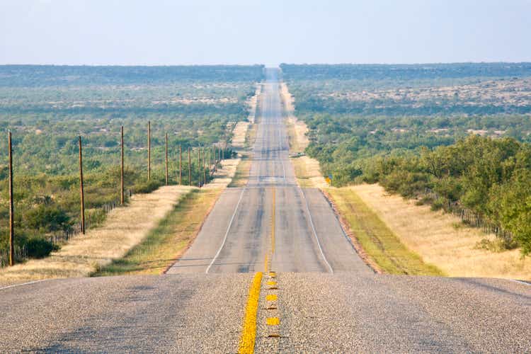 Rural Country Road, Long and Straight, Undulating to the Horizon