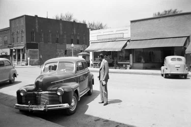 main street of small town USA with cars 1941, retro