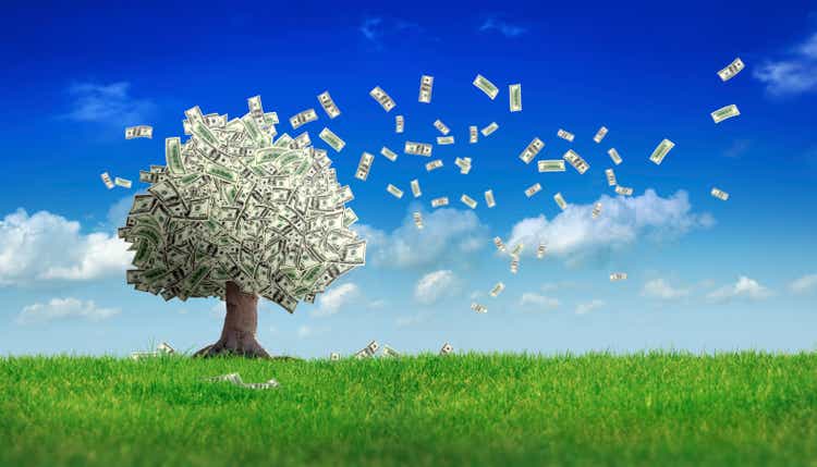 falling dollar bills from money tree