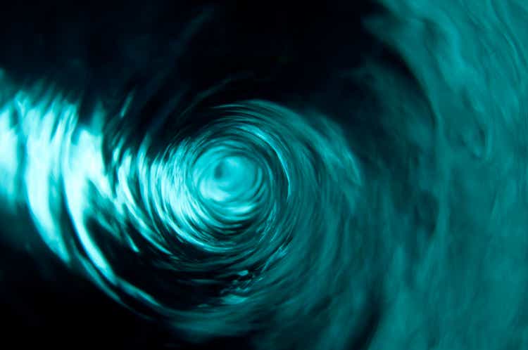 A beautiful clear teal water vortex