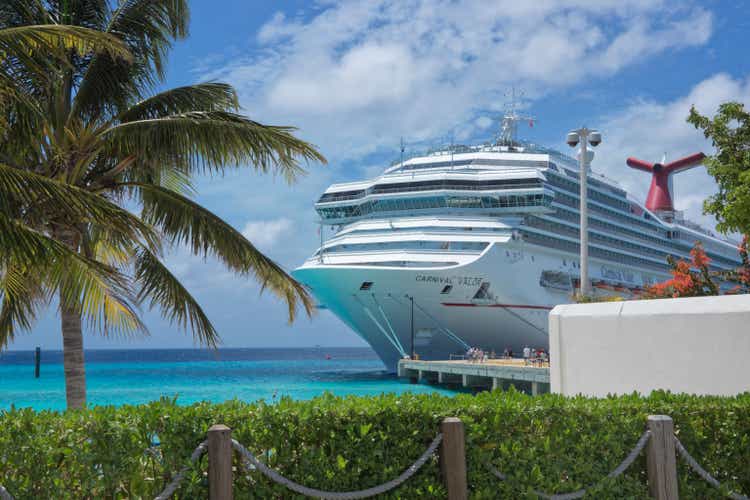 Imposing Carnival Valor Cruise Ship docked at Grand Turk harbor