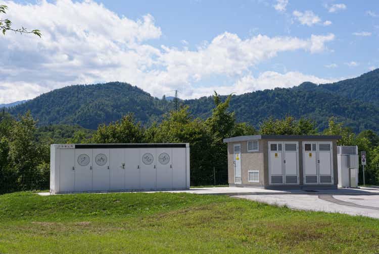 A static shot of Tesla Megapack battery at the Zirovnica supercharger in a sunny summer day. Selective focus