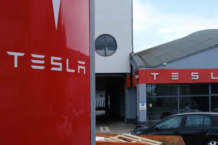 Tesla office, service station, American electric car manufacturer Elon Musk, current and major repairs, alternative energy development concept, electric vehicle production, Frankfurt - May 2023