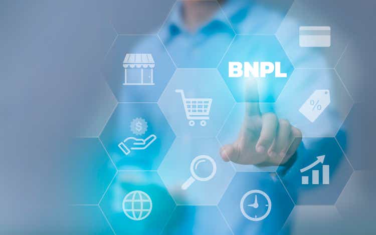 BNPL concept buy now pay later Marketing plans and personal marketing strategies Businessman touching BNPL screen