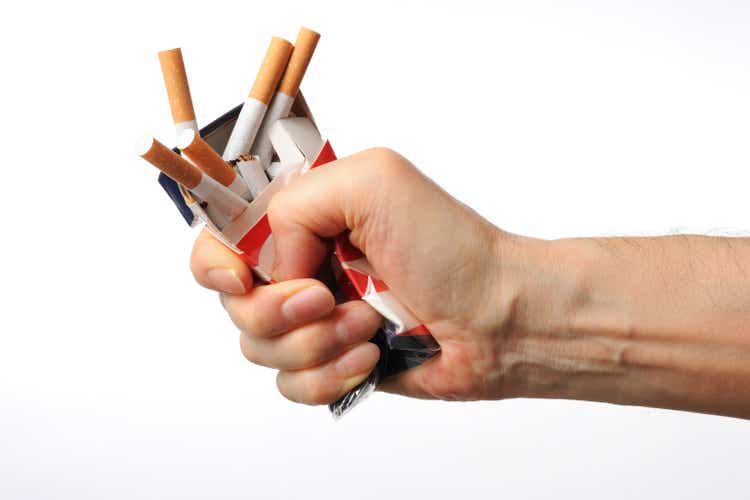 Isolated shot of broken cigarettes on white background