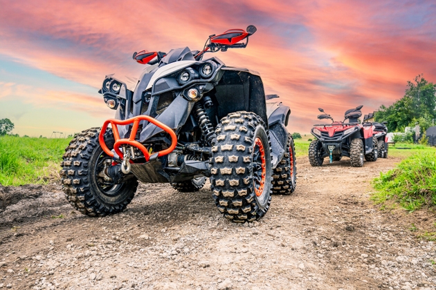 Quad ATV Moto Bike on green hills background in Polish mountains Zakopane