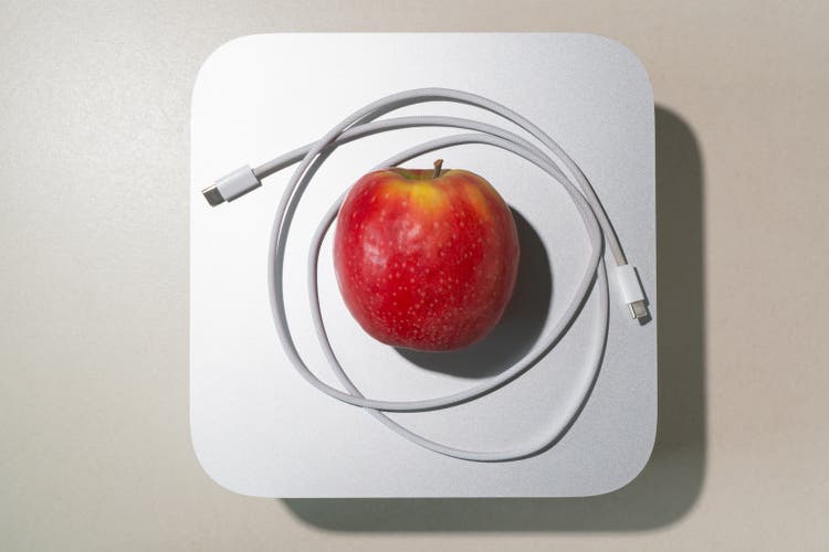 An apple and usb-c cable