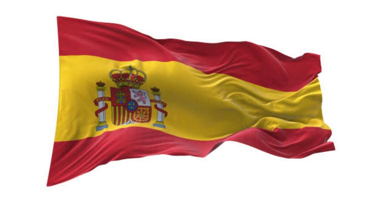 Spain flag waving isolated on white background.