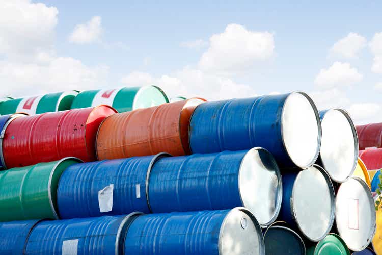 colorful stacked Barrels in front of the sky