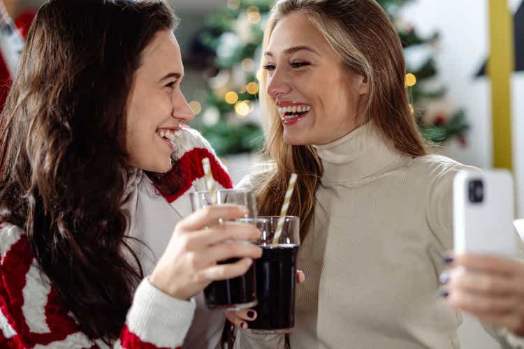 Close up of two young woman having fun