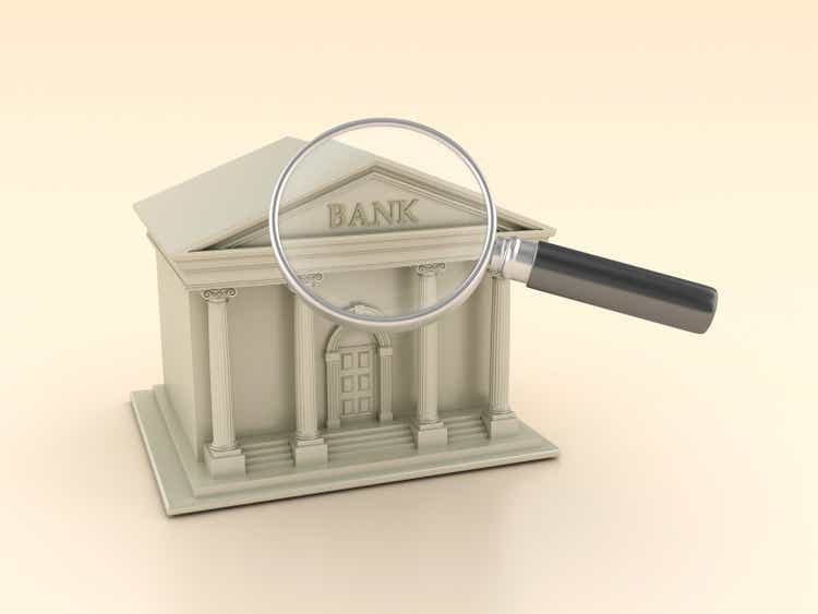 Bank Building with Magnifying Glass