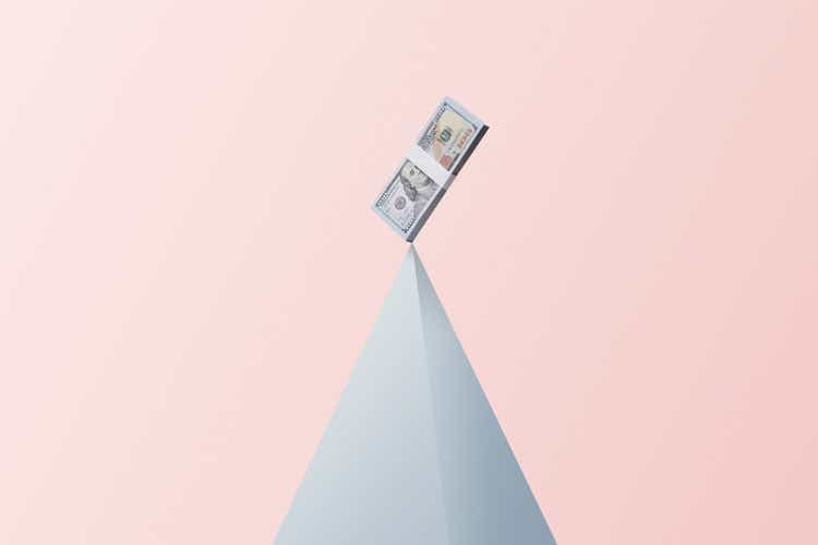 Money package is above the shape of the pyramid