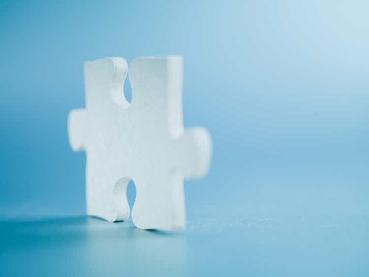 Jigsaw puzzle piece standing on end