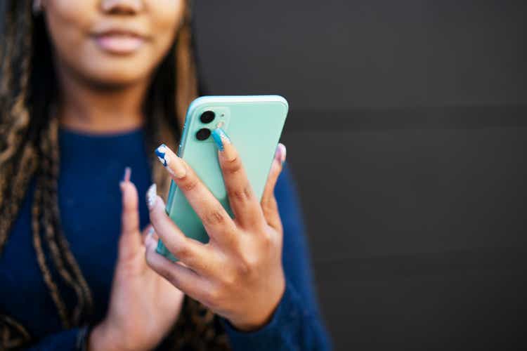 Close up of woman using smart phone