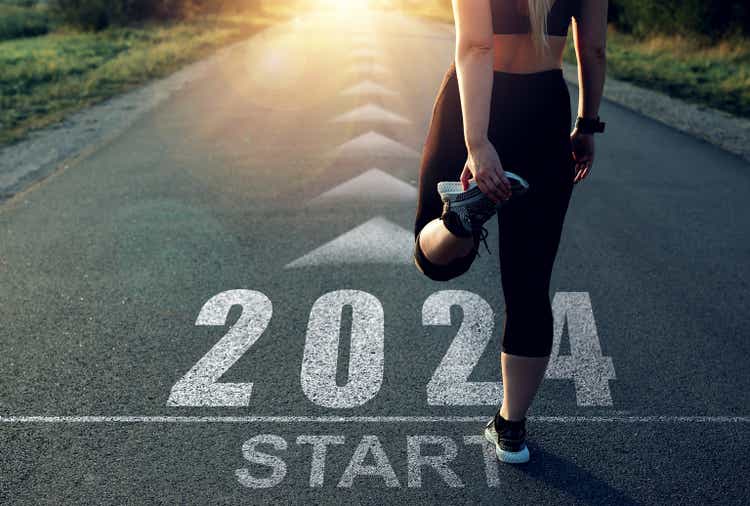 New Year 2024 with new ambitions, challenge, plans, goals and visions.Sports girl who wants to start the year 2024. Concept of new professional achievements in the new year and success.