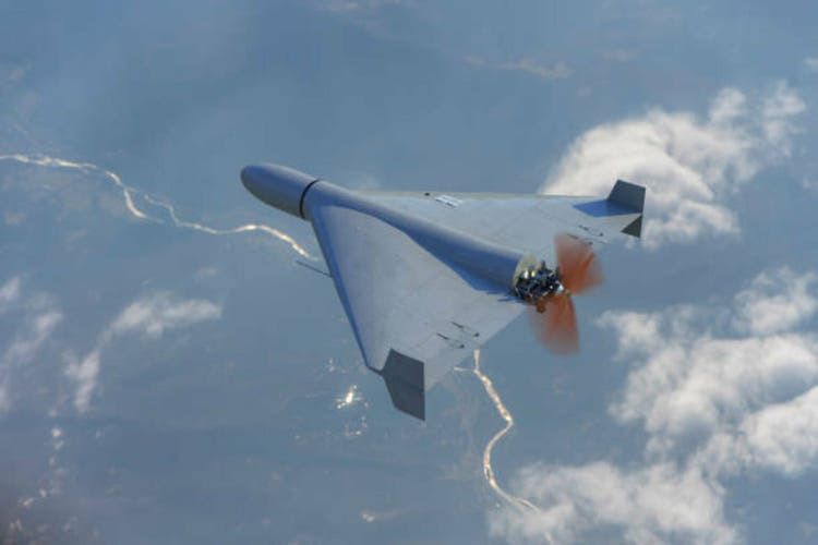 Top view of Russian army Shahid combat drone in the sky against clouds, flying over the ground war in Ukraine, drone attack, 3d render.