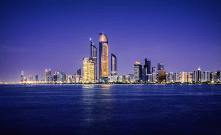 Illuminated nighttime skyline of Abu Dhabi