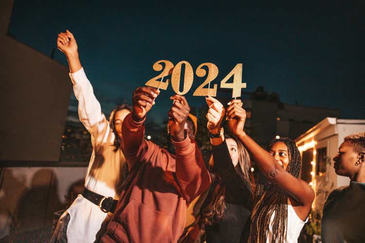 Group of friends celebrating 2024 new Year