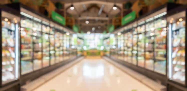 supermarket grocery store aisle and shelves blurred background