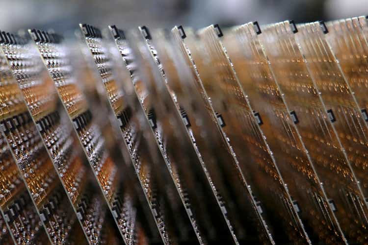 Close up of circuit boards on assembly line