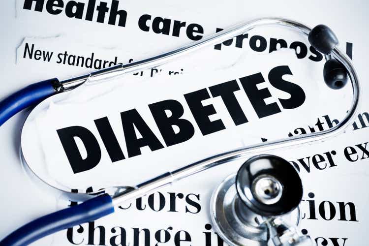 Stethoscope rests on headlines concerning diabetes