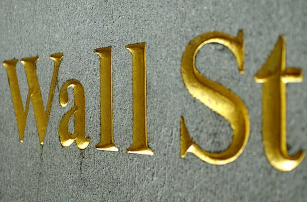 Wall Street slides as oil spikes and AI concerns grow louder