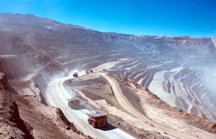 Ore trucks in an open pit mine