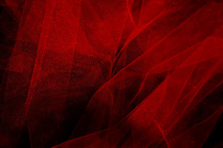 Red chiffon on a black background