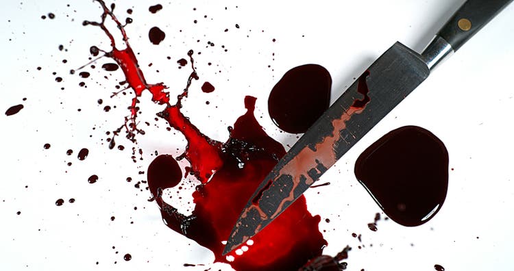 Knife with Blood against White Background
