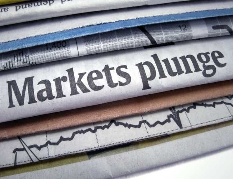 Newspapers stacked with Markets Plunge headline