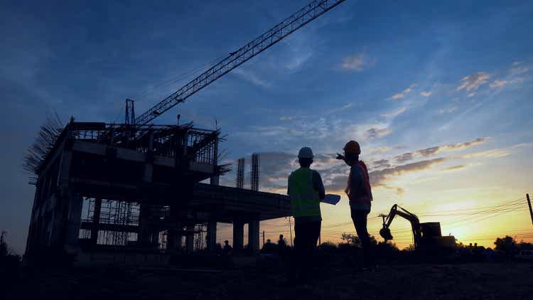 Engineer Teamwork Concept,Worker team join hands together in construction site.