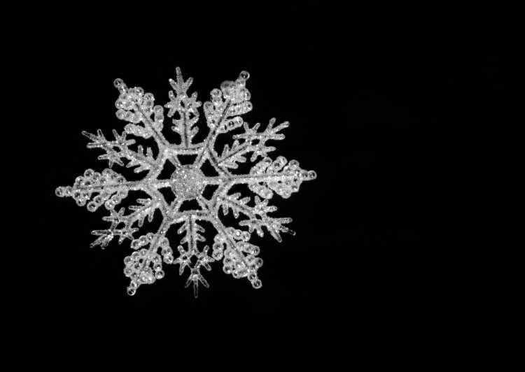 Icy snowflake on a black background