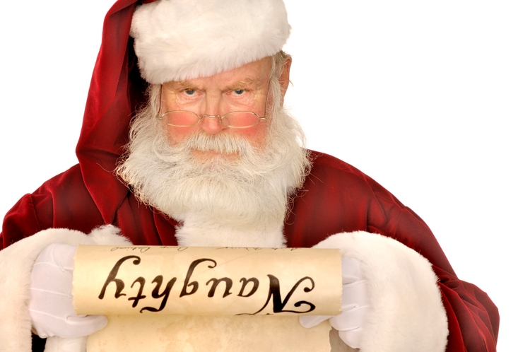 santa looking at naughty list