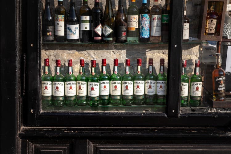 Jameson logo on some bottles for sale in a shop of Novi Sad. Jameson is a brand of irish whiskey, part of Pernod Ricard.