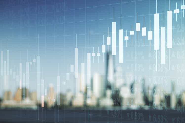 Double exposure of abstract creative financial chart hologram on blurry cityscape background, research and strategy concept