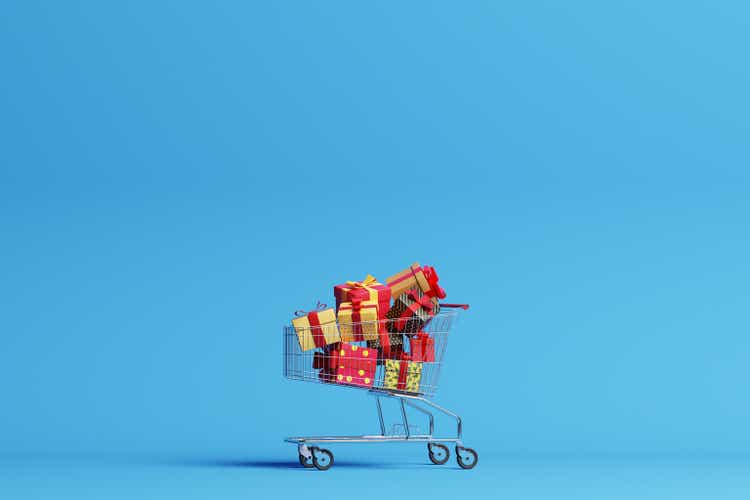 Shopping cart filled with christmas gifts