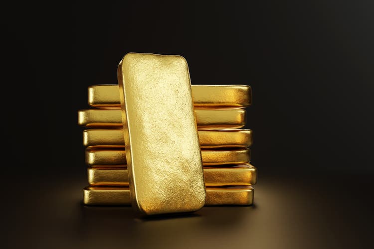 Gold bars rest against a pile of gold ingots.Precious metal trade and wealth concept illustration