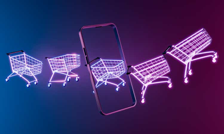 Neon shopping cart and smartphone