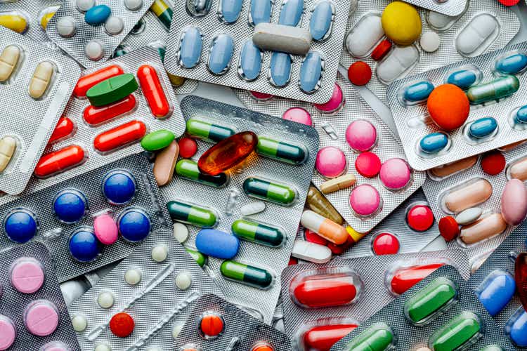 Background of a large group of assorted capsules, pills and blisters