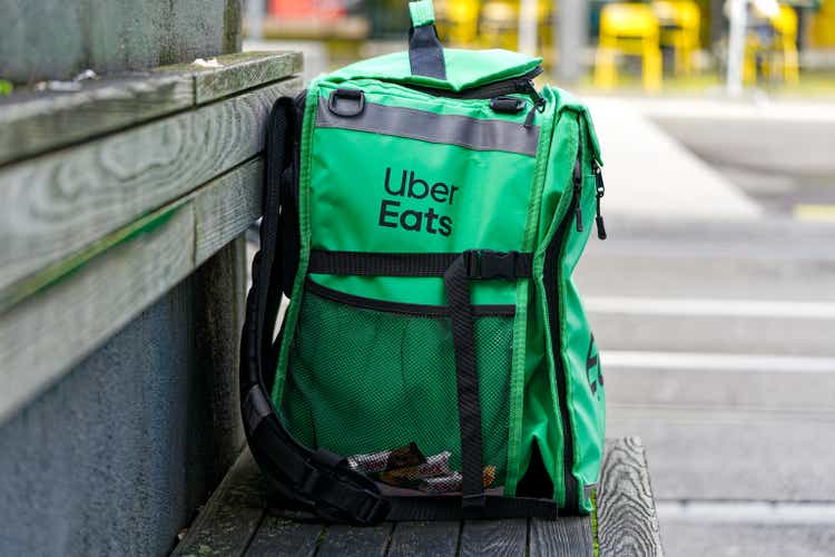 Close-up of delivery box of food delivery courier at Swiss town.