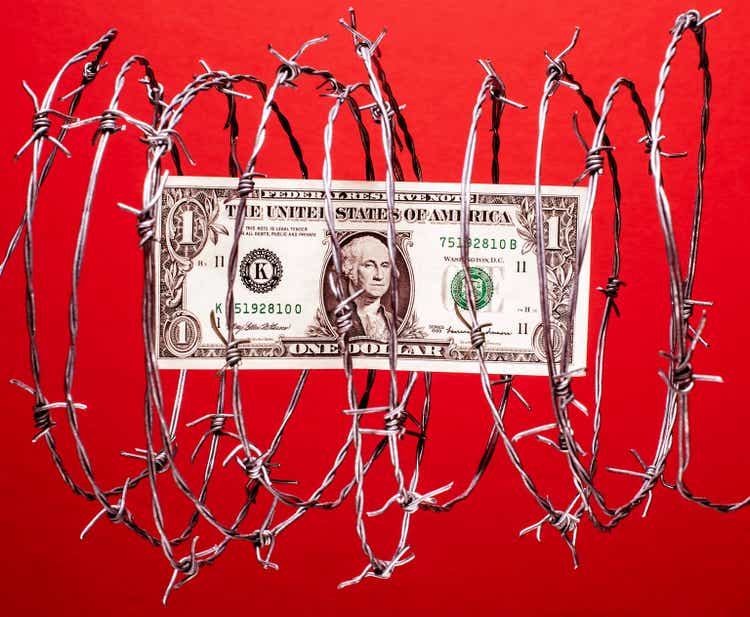 Money protection - Dollar in barbed wire