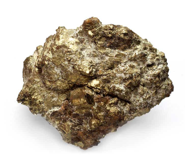 A nugget of uranium ore isolated on a white background