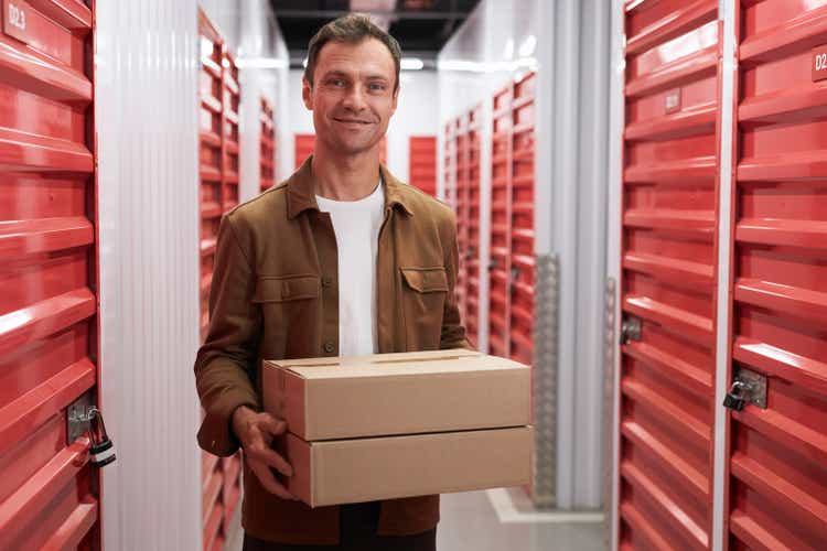 Mature Man with Cardboard Box